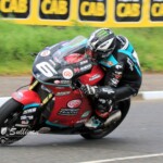 Rider accelerating down straight track section