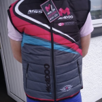 Team member wearing team jacket